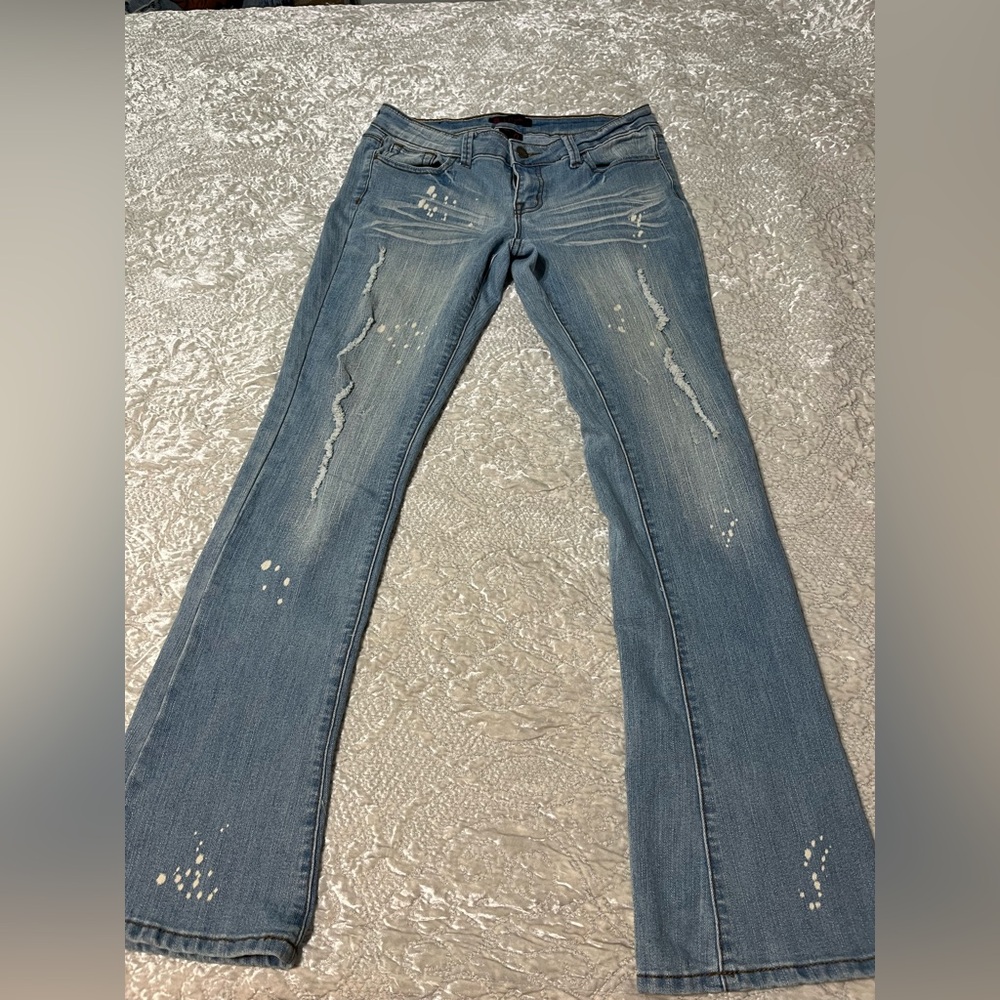 Distressed Light Blue Low rise flare Jeans. Size 9